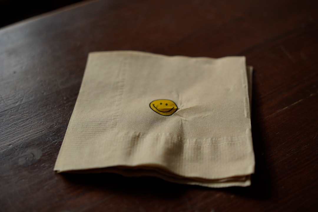 a napkin with a smiley face on it